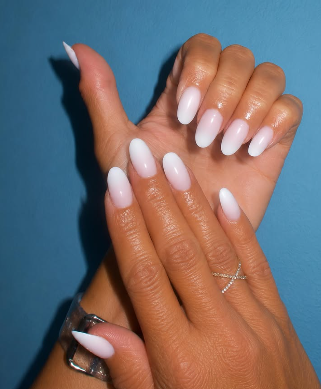 Soft milky-white almond nails
